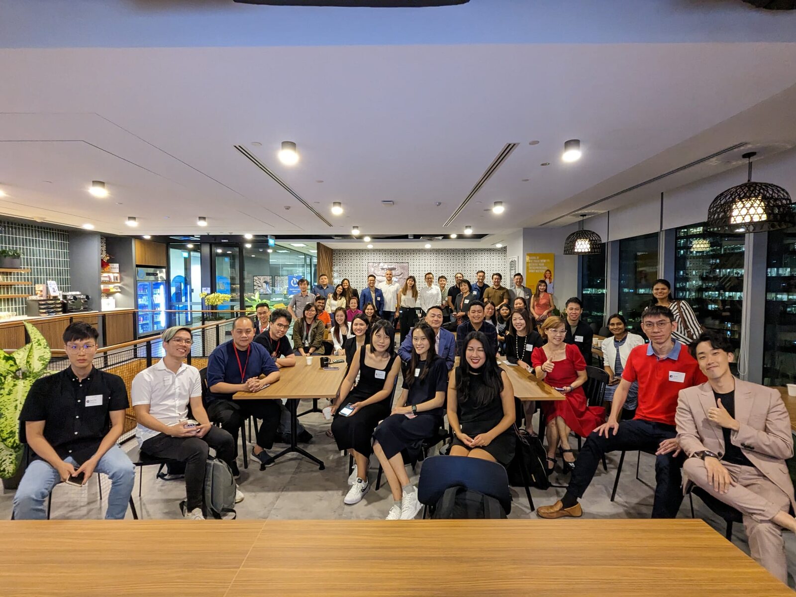 Diverse professional community gathered for a learning session